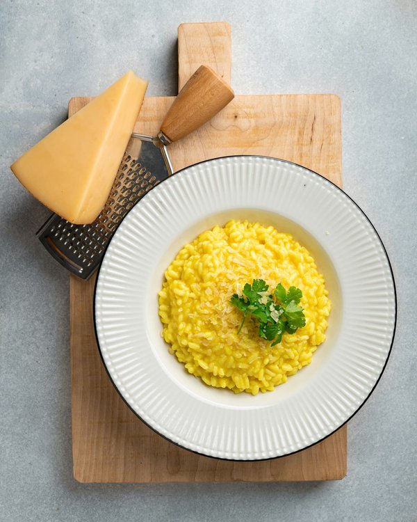 Quels sont les secrets pour réussir un risotto crémeux sans ajouter de crème?